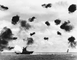 USS_Yorktown_(CV-5)_is_hit_by_a_torpedo_on_4_June_1942.jpg